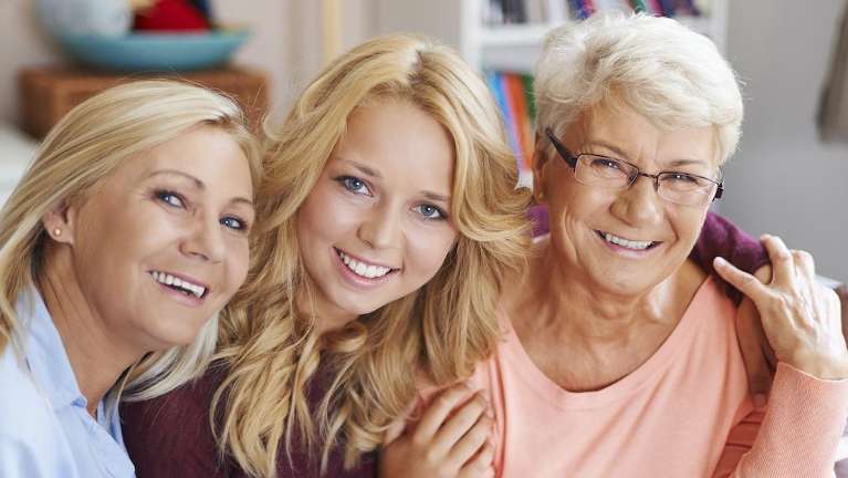 3 women smiling
