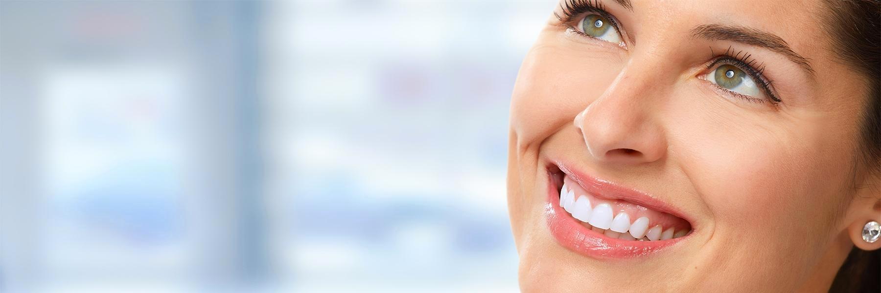 woman's smile after cosmetic teeth whitening in Chagrin Falls OH