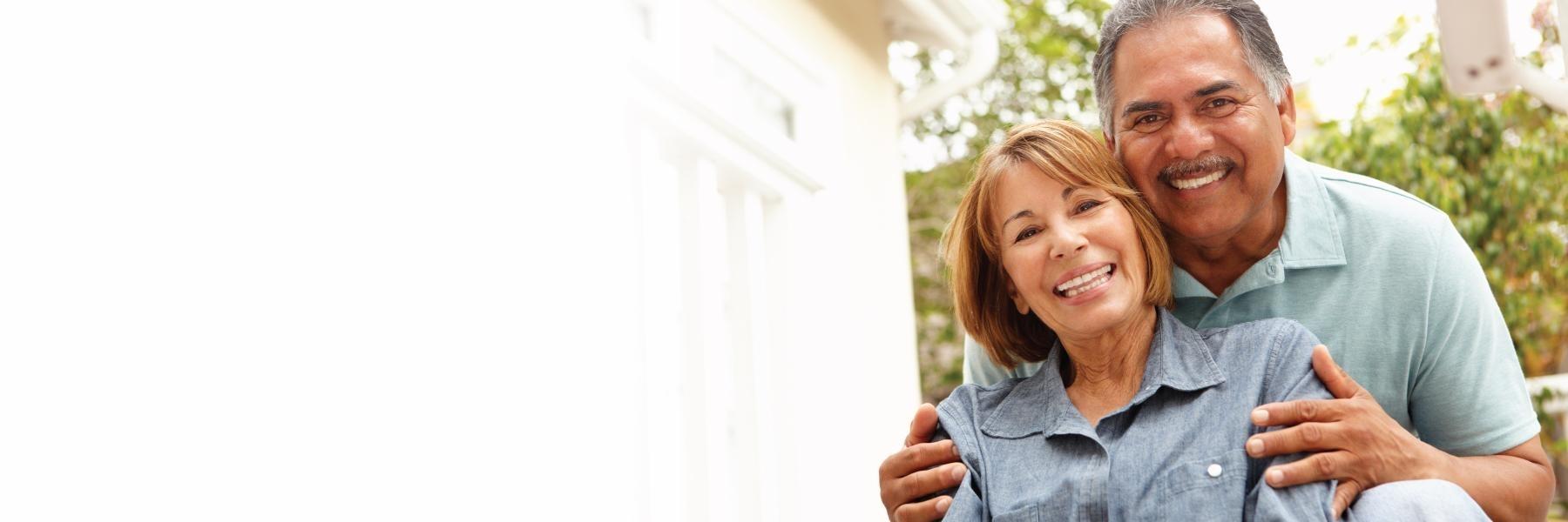 old man and woman smiling | dentist chagrin falls oh
